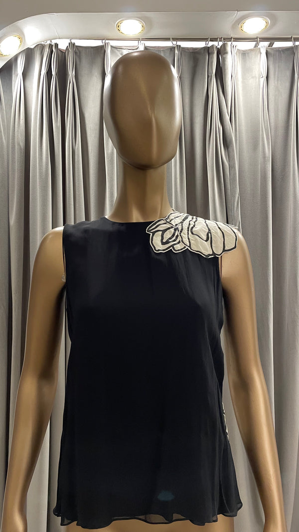 ENCROACHING TOP